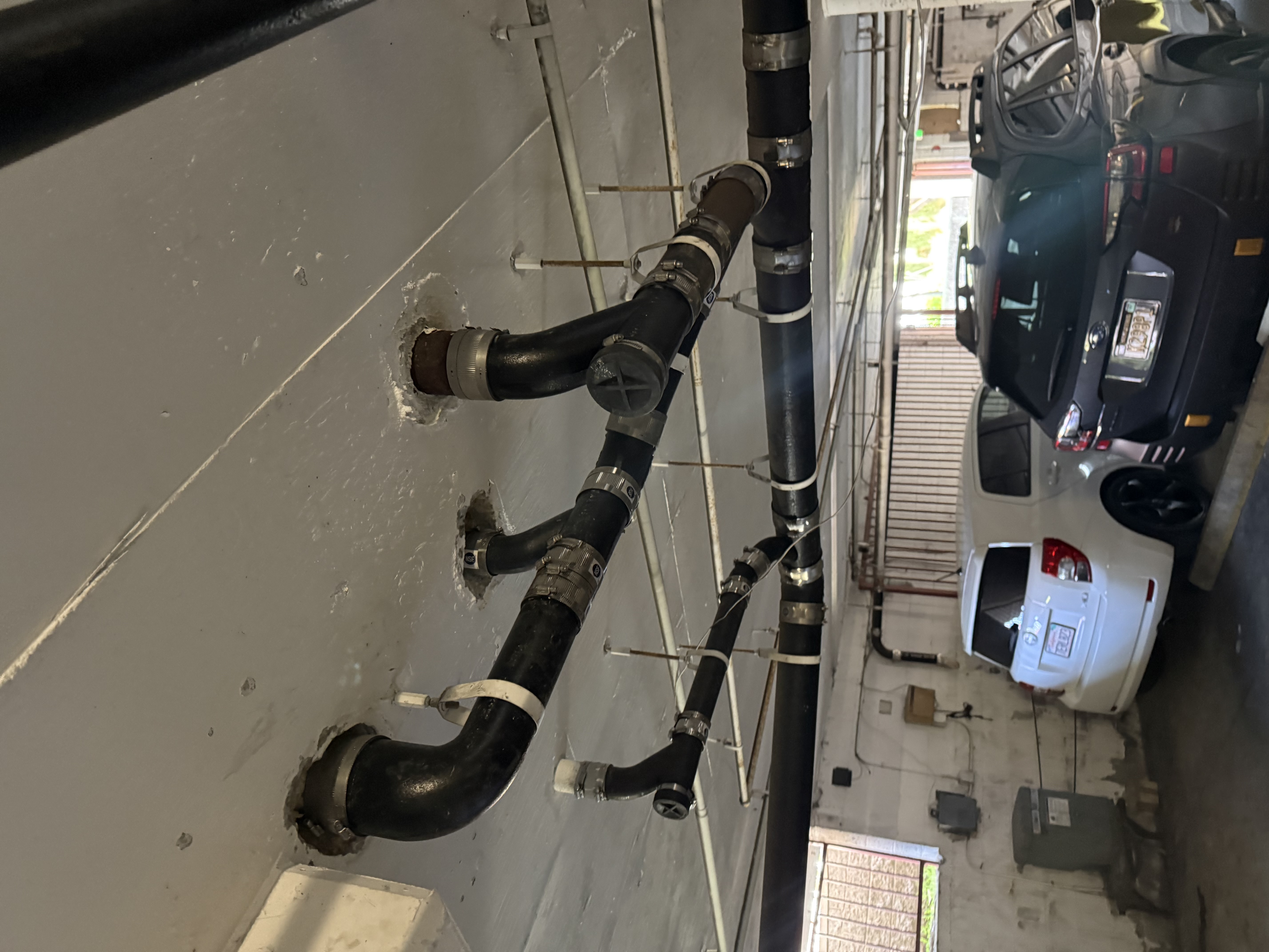Plumbing work in apartment utility space